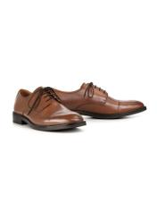 Men's leather brogues in cognac color BUTYM-0500-1F(W26), diagonal product view on a white background.
