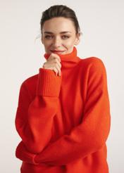 Orange women's turtleneck SWEDT-0249-30(Z25), front view of the product on the model. Half of the silhouette visible.