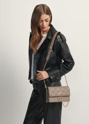 Dark beige women's handbag with monogram TOREC-0536-1K(W26), front view of the product on a model, half of the silhouette visible.