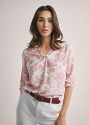 Women's pink floral blouse BLUDT-0172A-5P(W26), front view of the product on the model. Half of the silhouette visible.
