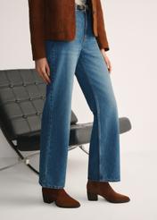 Women's suede ankle boots in cognac color BUTYD-1005A-1F(Z26), side view of the product on the model's feet.