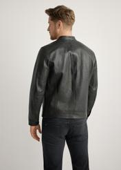 Black men's leather jacket KURMS-0406-99(W26) - back view of the product, on a model, against a light background. Knee-length silhouette visible.