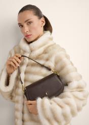 Small brown women's handbag TOREC-1264-1I(Z26), view of the product in the model's hands, on a light background.
