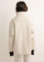 Cream-colored women's zip-up sweatshirt BLZDT-0126-0B(Z26), rear view on a model. Half-body shot.