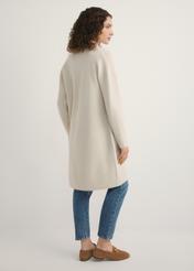 Beige women's cardigan KARDT-0041-1A(W26), back view of the product on the model. Half of the silhouette visible.