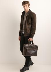 Brown leather men's bag TORMS-0542-1I(Z26), front view of the product in the model's hand.