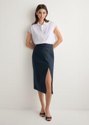 White women's shirt KOSDT-0189-0A(W26), front view of the product on the model. Full body visible.