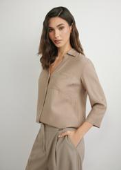 Dark beige women's shirt KOSDT-0157A-1D(W26), side view of the product on the model. Half of the silhouette visible.