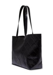 Black women's shopper bag with stitching TOREC-1247-9P(Z26), diagonal product view on a white background.