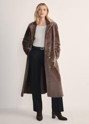 Women's long brown sheepskin coat KOZDS-0086- 3094(Z25) - front view of the product on a model, against a white background. Full body visible.