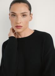 Black women's dress SUKDT-0260-99(W26), front view of the product on the model, close-up of the face.