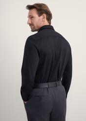 Black elegant men's shirt KOSMT-0339-99(Z25), back view of the product on the model. Half of the silhouette visible.