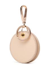 Cream keychain with mirror BRELOK-0216-16(Z25), product view from the back on a white background.