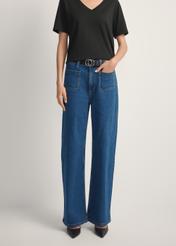Women's blue denim pants JEADT-0014-7H(W26), front view of the product on the model. Half of the silhouette visible.