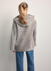 Light gray women's sheepskin coat KOZDS-0092-3098(Z25), back view of the product on the model. Half of the silhouette visible.