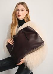 Large brown shopper bag TOREC-0995A-89(Z25), front view of the product on a model, view on a white background.