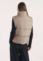 Dark beige women's vest KAMDT-0033-24(Z25), product view from the back on the model, half of the silhouette visible.
