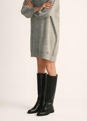Black leather women's boots BUTYD-1204-99(Z25), product view on model's feet against a light background.