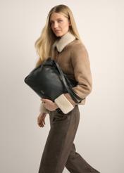 TORES-1376-99(Z26), black leather shoulder bag, front view of the product on a model. Half of the silhouette visible.