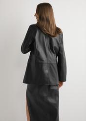 Women's black leather jacket KURDS-0606-99(W26) - back view of the product on a model, against a light background. Knee-length silhouette visible.