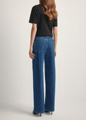 Women's blue denim pants JEADT-0014-7H(W26), back view of the product on the model. Half of the silhouette visible.