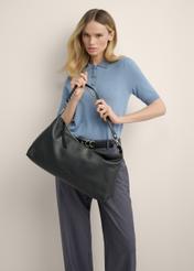 Black leather women's handbag TORES-1320-99(Z26), product view in model's hand. Half of silhouette visible.