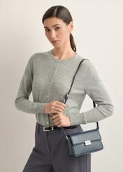 Elegant navy blue women's handbag TOREC-1251-7E(Z26), diagonal view of the product on the model. Half of the silhouette visible.