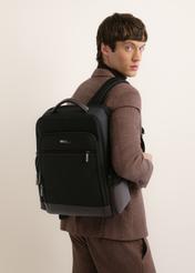 Black large men's backpack TORMN-0435-9J(Z26), product view diagonally on the model. Half of the silhouette visible.