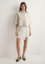 Women's white culottes SZODT-0008-0B(W26), front view of the product on the model. Full body visible.