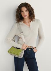 Two-piece women's handbag TOREC-1187-1K(W26) - product view slightly diagonal, on a model, against a light background. Knee-length silhouette visible.