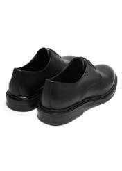Black leather men's shoes BUTYM-0553-99(Z26), product view from the back on a white background.