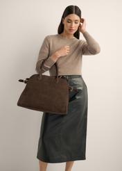 Dark brown leather shopper bag TORES-1412-1H(Z26) - a slightly diagonal view of the bag, held by the model, against a light background. The knee-length silhouette is visible.