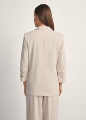 Women's light beige jacket ZAKDT-0043-1A(W26), product view from the back on the model, half of the silhouette visible.