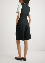 Women's elegant black shorts SZODT-0017-99(W26), back view of the product on the model. Half of the silhouette visible.