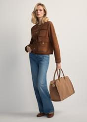 Beige suede handbag TORES-1191-1B(W26), product view in model's hand. Full body visible.