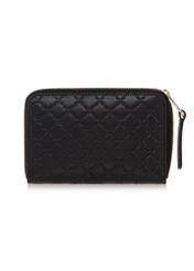 Black leather women's wallet with embossing PORES-0836A-99(W23)-03