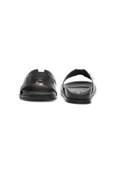 Black women's leather flip-flops BUTYD-1163-99(W25), front and back product view on white background.