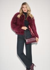 Burgundy small leather clutch bag TORES-1188-49(Z25) - front view of the product, on a model, on a white background.