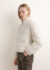 Cream-colored short women's fur coat FUTDP-0092-0B(Z26), side view on a model. Half-body shot.
