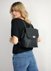 Black women's backpack TOREC-1138-9I(W26), front view of the product on the model's silhouette.