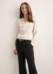 Cream women's viscose blouse BLUDT-0216-1A(Z26), product view from the front on the model, half of the silhouette visible.