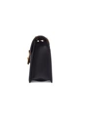 Leather black women's handbag with decorative element TORES-1394-99(Z26) - side view, on a white background.