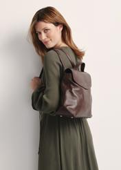 Brown women's leather backpack TORES-1185-89(Z25) - product view on a model on a white background. Half of the silhouette visible.