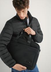 Black men's briefcase TORMN-0403-99(W26), front view of the product in the model's hands. Half of the silhouette visible.