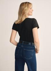 Black women's basic T-shirt TSHDT-0111-99(KS), back view of the product on the model. Half of the silhouette visible.