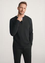 Black men's longsleeve LSLMT-0007-99(Z24), front view of the product on the model, half of the silhouette visible.