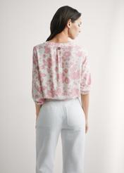 Women's pink floral blouse BLUDT-0172A-5P(W26), back view of the product on the model. Half of the silhouette visible.