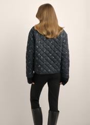 Women's reversible jacket with a lilac pattern KURDT-0710-99(Z26), product view from the back on the model. Half of the silhouette visible.