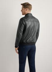 Men's black leather jacket KURMS-0392-99(W26) - back view of the product, on a model, against a light background. Knee-length silhouette visible.