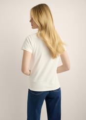 Cream-colored cotton women's T-shirt with print, model number TSHDT-0164-0B(Z26). Back view of the product on a model. Half of the figure is visible. 
